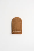 Brown suede glove with 'The Boyfriend Mitt' logo on a white background